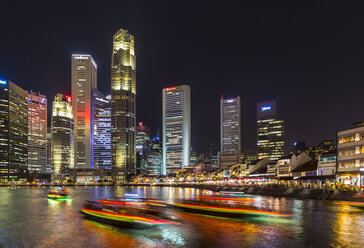 View of Singapore river and skyline at night, Singapore, South East Asia - CUF11595