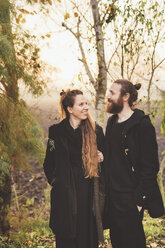 Couple in misty woodland - CUF11959