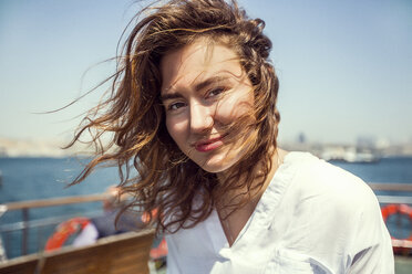 Portrait of young female tourist on passenger ferry deck, Beyazit, Turkey - CUF12114