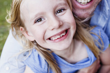 Cropped close up of father and daughter in park - CUF12953