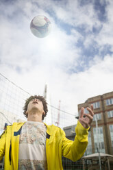 Young man practising football skills - CUF13052