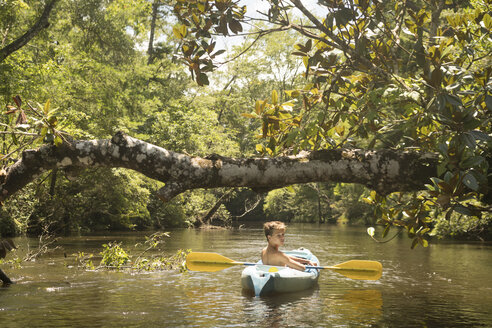Teenage boy in kayak, Econfina Creek, Youngstown, Florida, USA - ISF02179