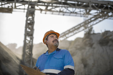 Portrait of quarry worker in quarry - ISF02789