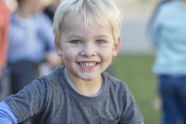 Portrait of young boy, outdoors, smiling - ISF02945