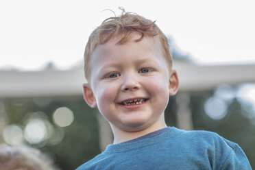 Red haired boy at preschool, portrait in garden - ISF02948