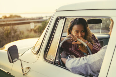 Romantic couple in pickup truck at Newport Beach, California, USA - ISF04335