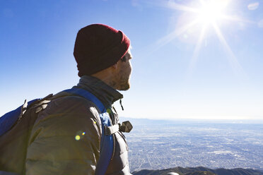 Hiker at viewing point, Cucamonga Peak, Mount Baldy, California, USA - ISF04428