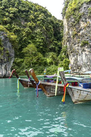 Thailand, Koh Yao Noi, typical wooden boats moored in front of ko Hong Island stock photo