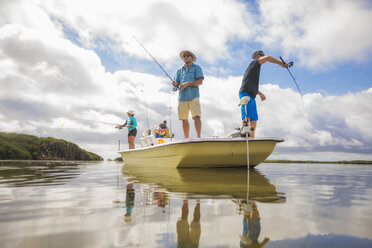 Men fishing in the Gulf of Mexico, Homosassa, Florida, US - ISF05562