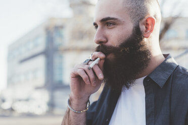 Bearded man smoking - ISF05921