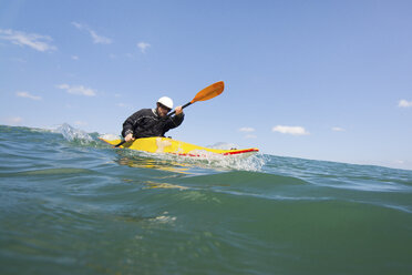 Man paddling kayak at sea, Las Huacas, Guanacaste, Costa Rica, Central America - ISF06385