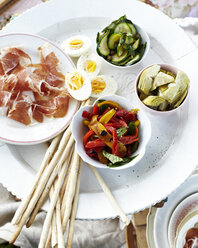 Overhead view of antipasto platter on white tray - CUF13872