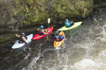 High angle view of kayakers on River Dee rapids, Llangollen, North Wales - CUF14238