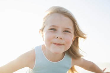 Portrait of girl looking at camera smiling - CUF14440