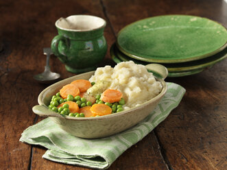 Carrots and peas with mashed potato in oval dish - CUF14688