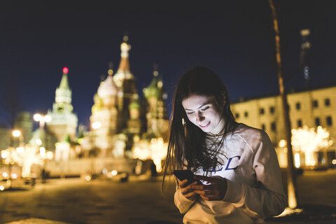 Russia, Moscow, young woman in the city at night stock photo