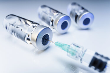 Injectable medications in sealed vials and a disposable plastic medical syringe - CUF15484