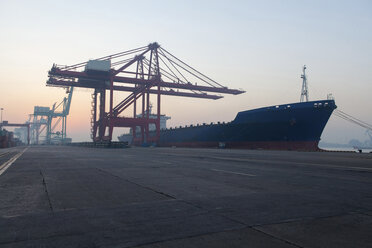 Container ship and cranes at port - CUF16010