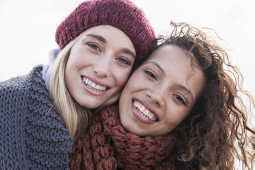 Portrait of two young female friends at beach, Western Cape, South Africa - CUF16358