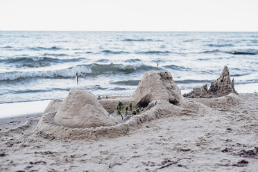 Germany, Ruegen, sandcastle on the beach - MJF02279