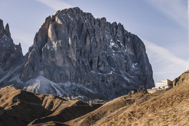 Rugged mountain landscape and hillside building, Dolomites, Italy - CUF17861