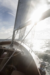 Yacht on ocean in sunlight - ISF07415