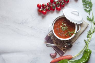 Cooking pot of homemade tomato soup on marble - SKCF00459