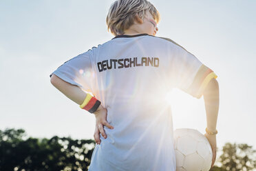 Boy wearing football shirt with Germany written on back - MJF02333
