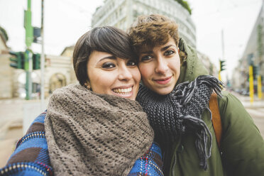 Portrait of two sisters, smiling, outdoors - CUF20710