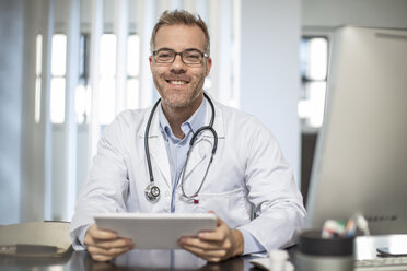 Portrait of smiling doctor in medical practice - ZEF15501