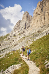 Hikers on mountain path looking at camera, Austria - CUF21067