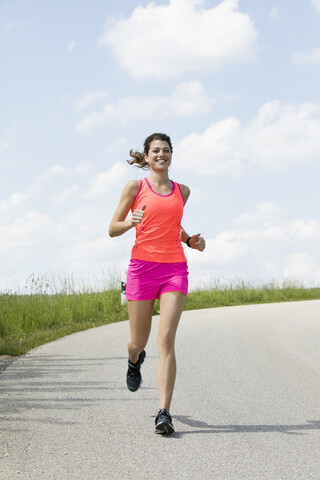 Young woman jogging stock photo