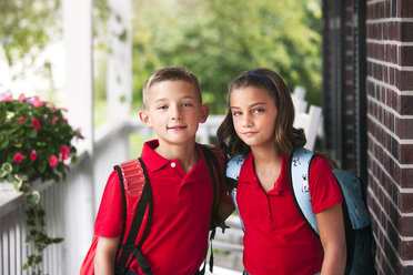 Portrait of twin brother and sister on first day of new school year - ISF07602