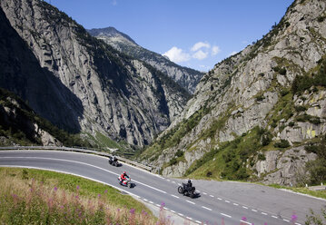 Bikers crossing Alpine, Gotthard Pass, Ticino, Switzerland - CUF22000