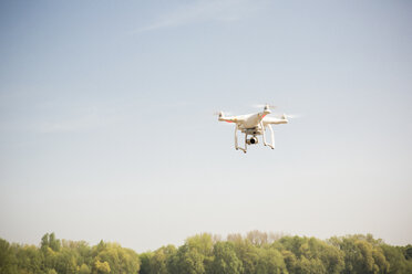 Drone flying in blue sky - ONF01141