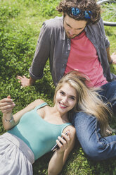Couple relaxing in park - CUF22984