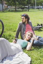 Couple relaxing in park - CUF23000