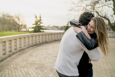 Romantic couple hugging in Battersea Park, London, UK - CUF23081