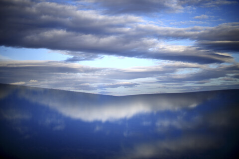 Spain, Castilla y Leon, Province of Zamora, Reserva natural de Lagunas de Villafafila, water reflection and clouds stock photo