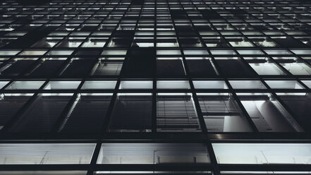 Low angle view of illuminated building in city at night - FSIF03024