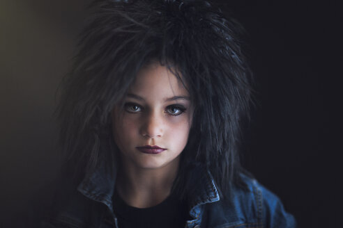 Portrait of girl dressed up as punk looking at camera - ISF08989