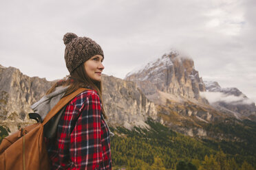 Hiker enjoying scenery, Mount Lagazuoi, Dolomite Alps, South Tyrol, Italy - CUF23556