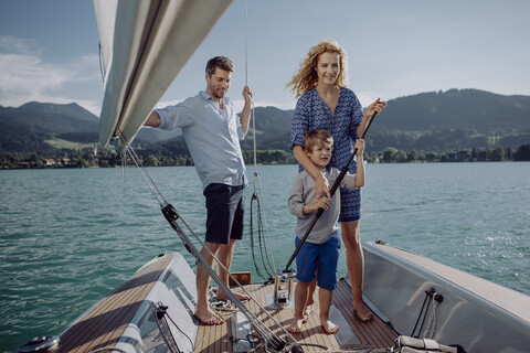 Family on a sailing trip stock photo