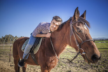 Young man on horse - CUF24719