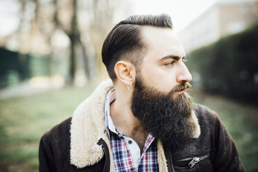 Young bearded man in park - CUF24859