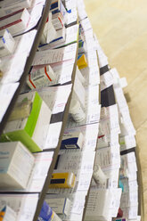 Low angle view of medicines in shelves in pharmacy - CUF25761