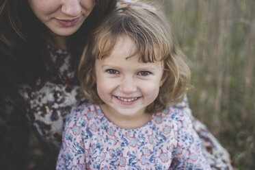 Close up portrait of young girl and mother - CUF26596