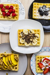 Plates of waffles with various toppings - GIOF03968