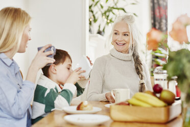 Three generation family having breakfast - CUF27680