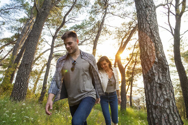 Young couple strolling in coastal forest, Split, Dalmatia, Croatia - CUF27740